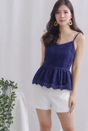 Arelis Eyelet Spag Peplum Top In Navy Blue