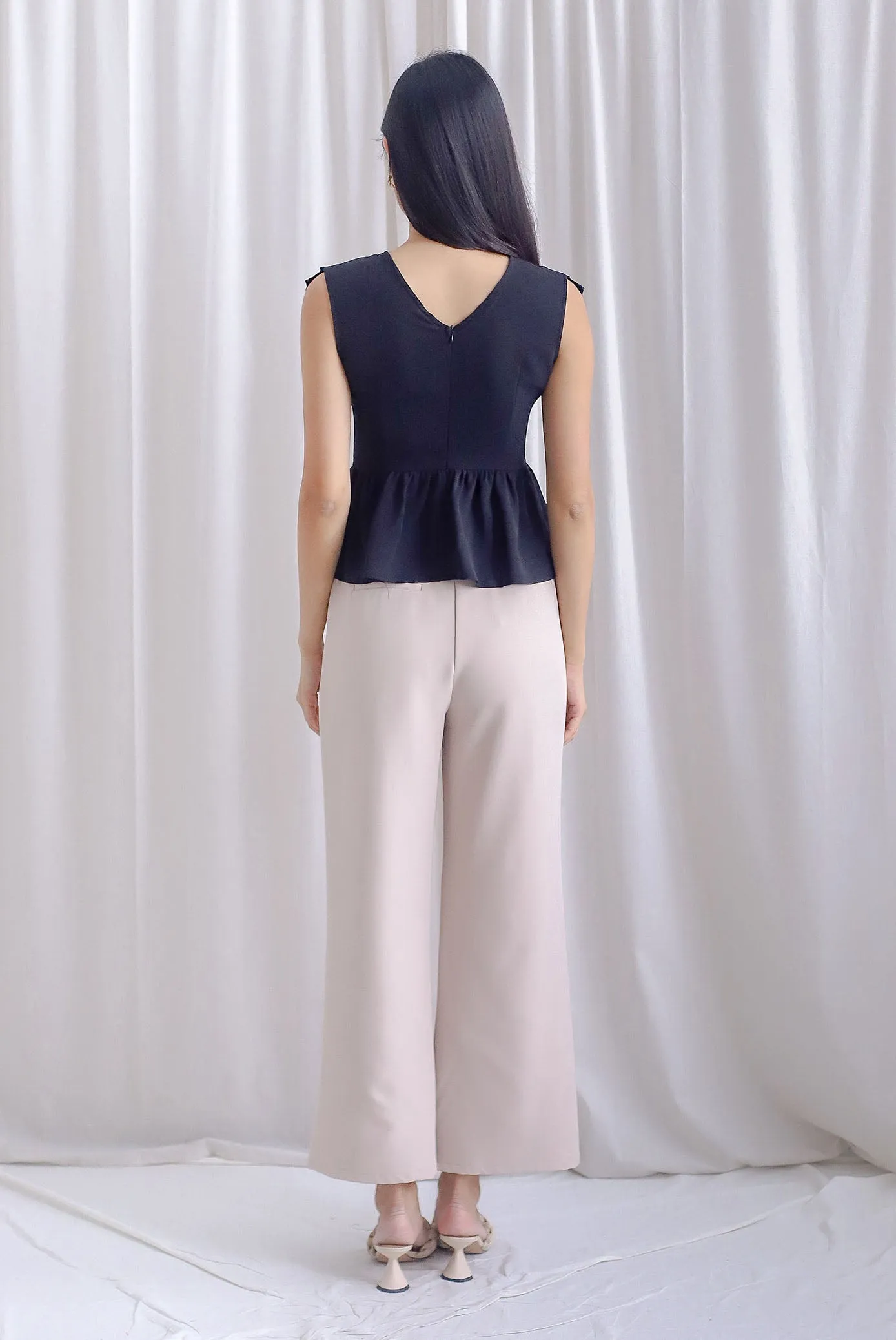 Elisa Pleated Peplum Top In Black