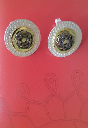 Exquisite, tri-metal,round ear studs with black rhodium plated detailing in center