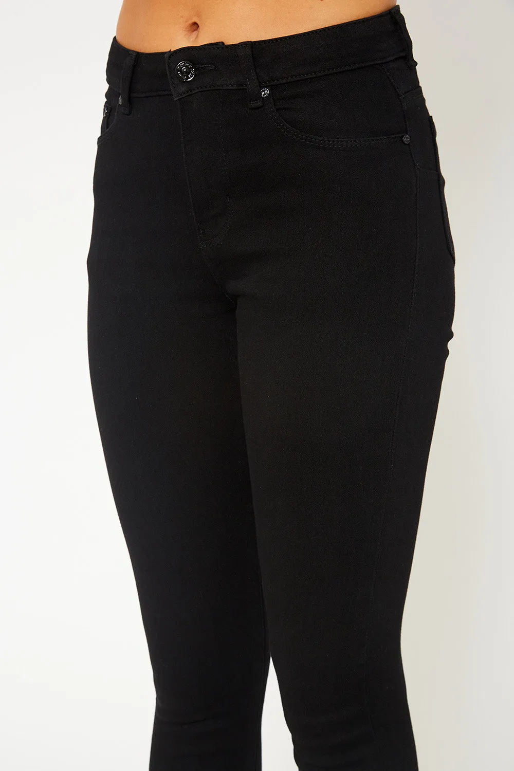 High-rise black skinny pants