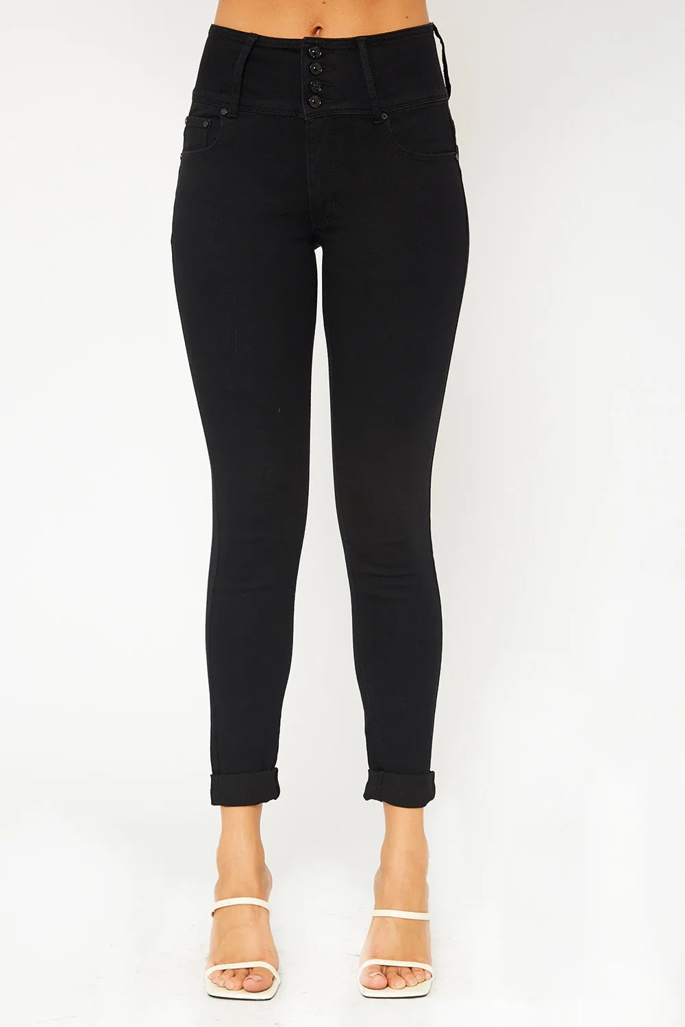 High-rise four button black skinny pants
