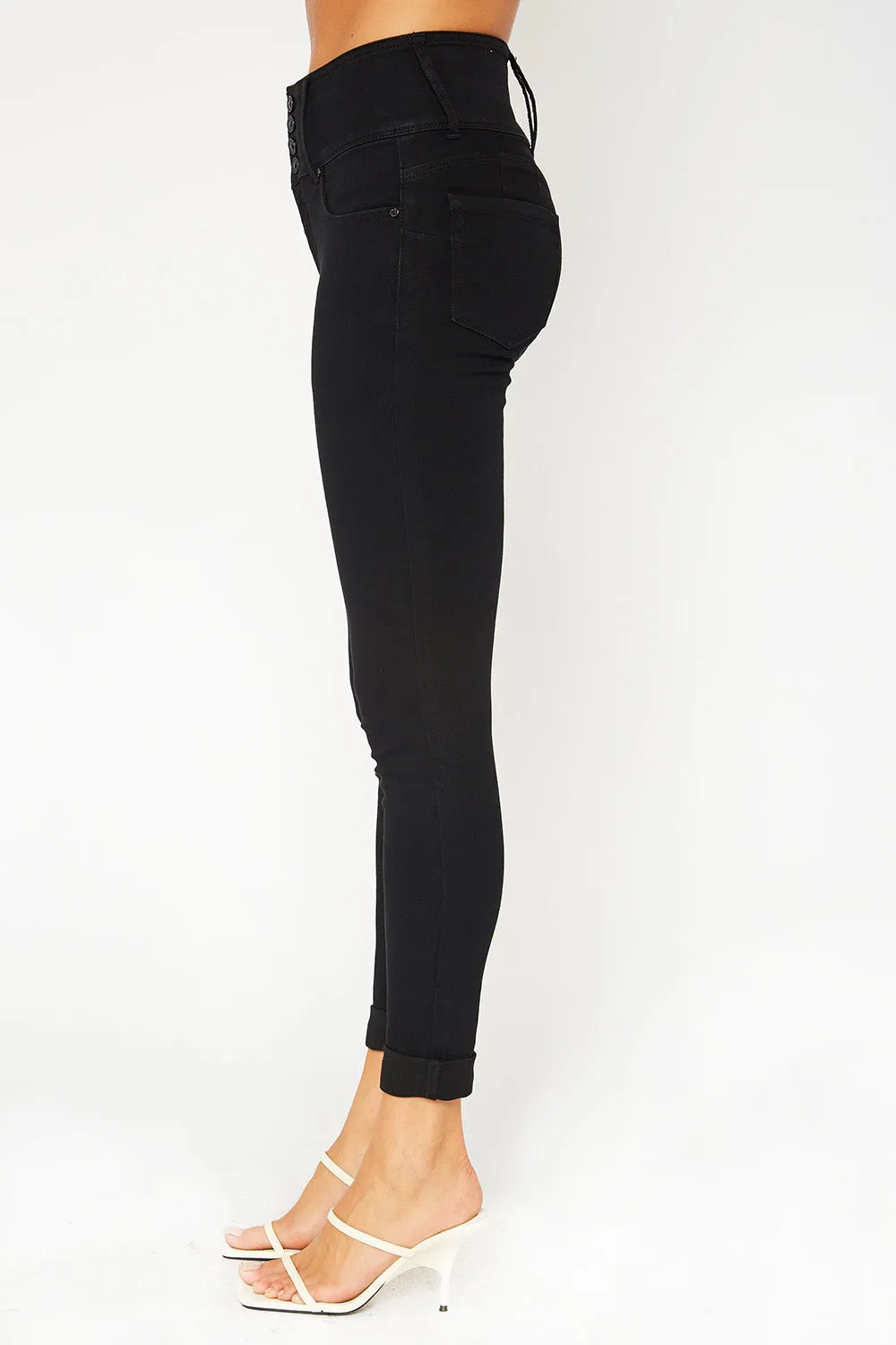 High-rise four button black skinny pants