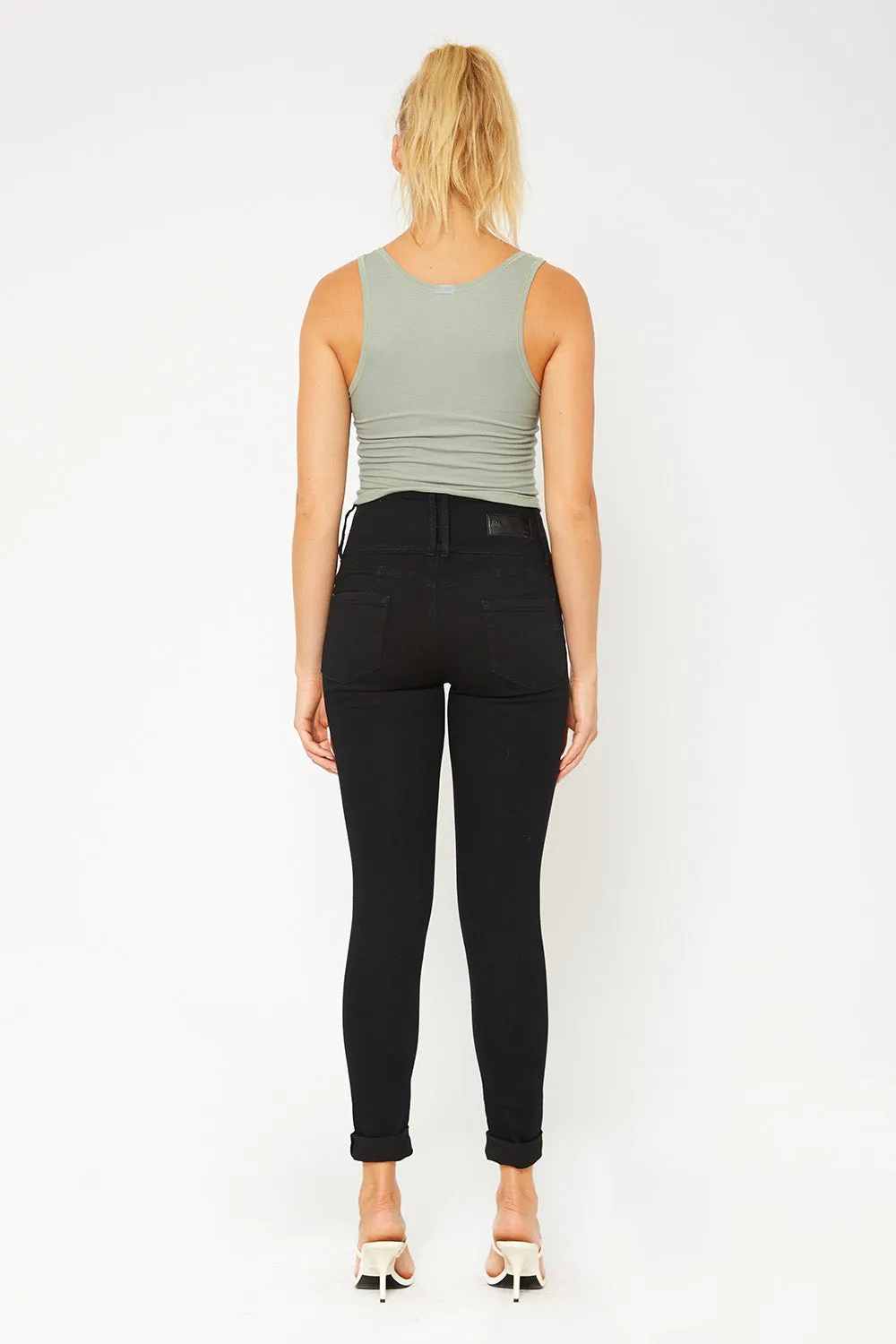 High-rise four button black skinny pants