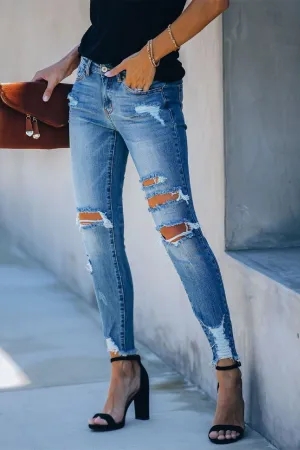 Worldwide Mid Rise Distressed Skinny - Medium Wash