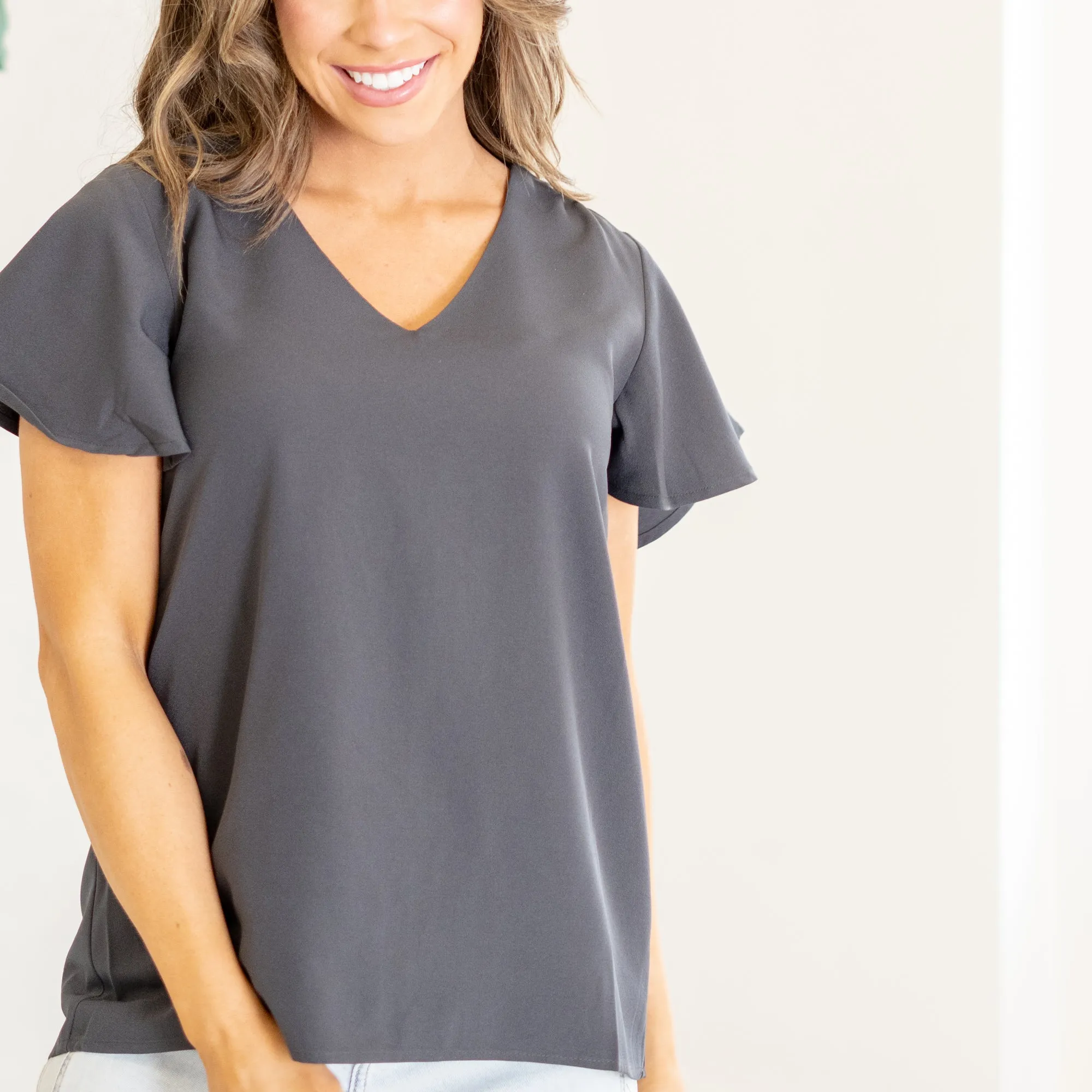 Woven flutter sleeve v-neck top